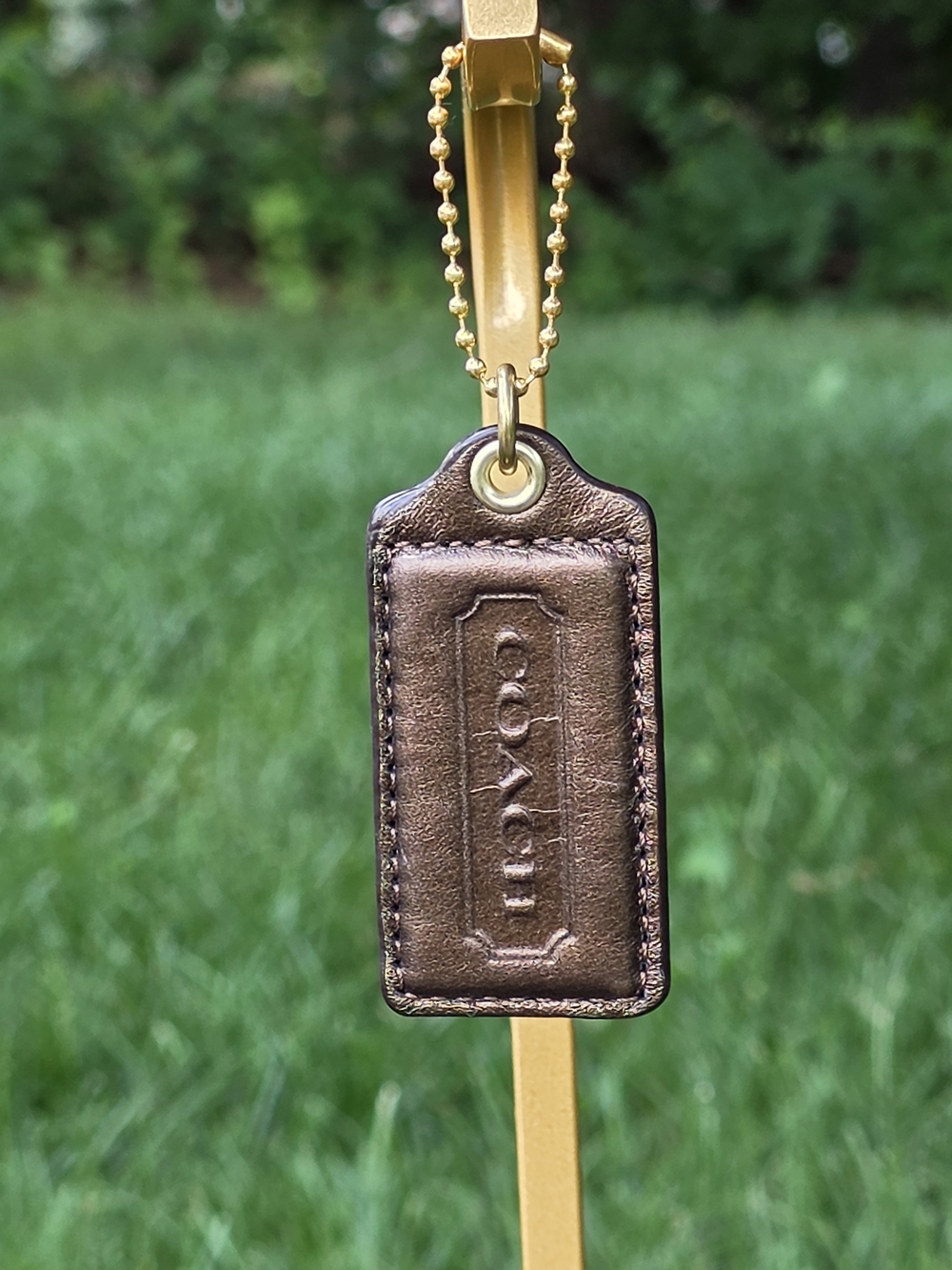 Coach Large Metallic Bronze Leather Hangtag